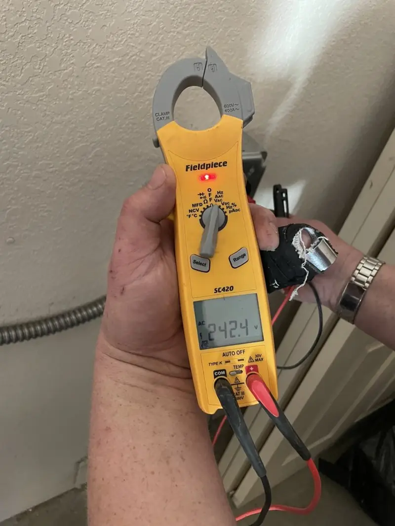 Voltage testing with clamp meter during Aluminum Wiring Replacement in North Arlington